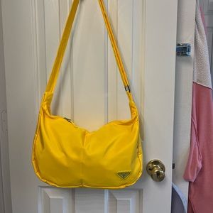 Designer inspired larger capacity crescent hobo bag. Sunny yellow. Never used